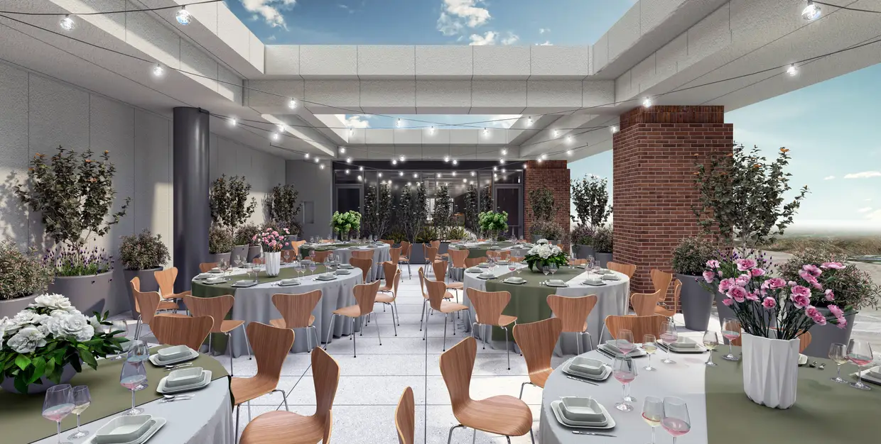 The rooftop event terrace set for dining.
